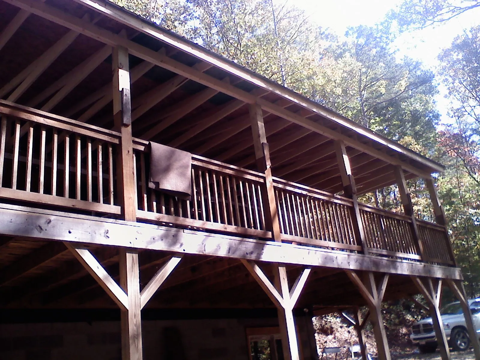 Timber framing under a new elevated porch and deck — Roof Leak Repair in Lakemore by Roofing Brothers